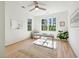 Light-filled home office with hardwood floors and large windows at 2737 Sarazen Dr, Mount Pleasant, SC 29466