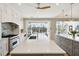 Bright kitchen with expansive island, stainless steel appliances, and access to outdoor space at 2737 Sarazen Dr, Mount Pleasant, SC 29466