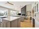 Open kitchen with a view of the living room and fireplace at 2737 Sarazen Dr, Mount Pleasant, SC 29466