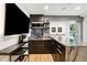 Modern kitchenette with dark cabinetry and marble countertops at 2737 Sarazen Dr, Mount Pleasant, SC 29466