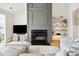 Living room features a modern fireplace and built-in shelving at 2737 Sarazen Dr, Mount Pleasant, SC 29466