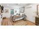 Spacious main bedroom with king-size bed and fireplace at 2737 Sarazen Dr, Mount Pleasant, SC 29466