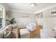 Cozy sitting room with wainscoting, neutral decor, and hardwood floors at 2737 Sarazen Dr, Mount Pleasant, SC 29466