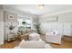 Cozy sitting room with wainscoting, neutral decor, and hardwood floors at 2737 Sarazen Dr, Mount Pleasant, SC 29466