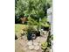 Outdoor patio area with various potted plants and pavers, providing a tranquil retreat at 2757 Jobee Dr # 1101, Charleston, SC 29414