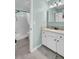 Updated bathroom with white vanity, shower/tub combo, and light blue walls at 2757 Jobee Dr # 1101, Charleston, SC 29414