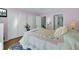 Lovely bedroom with white bedding and a view of the backyard at 2757 Jobee Dr # 1101, Charleston, SC 29414