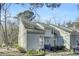 Exterior view of townhome community showcasing a similar light gray townhome at 2757 Jobee Dr # 1101, Charleston, SC 29414