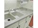 Modern double sink with white cabinets and countertops at 2757 Jobee Dr # 1101, Charleston, SC 29414