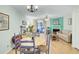 Open concept living room with hardwood floors and view of dining area at 2757 Jobee Dr # 1101, Charleston, SC 29414