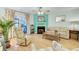 Living area features a fireplace, hardwood floors, and comfortable seating at 2757 Jobee Dr # 1101, Charleston, SC 29414