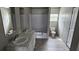 Bright bathroom features a double sink vanity, tub-shower combo, and a toilet at 377 Seven Acres Rd, Saint George, SC 29477