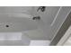 Close up of new bathtub with shower head at 377 Seven Acres Rd, Saint George, SC 29477