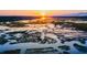 Sunset view of waterfront property with docks at 3917 Delinger Dr, Mount Pleasant, SC 29466