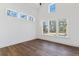 Bedroom with hardwood floors and multiple windows offering natural light at 3917 Delinger Dr, Mount Pleasant, SC 29466