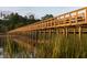 Long wooden community dock over calm water at 3917 Delinger Dr, Mount Pleasant, SC 29466