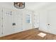 Bright entryway with hardwood floors, double doors, and a unique light fixture at 3917 Delinger Dr, Mount Pleasant, SC 29466