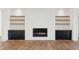 Modern living room with a fireplace and built-in shelving at 3917 Delinger Dr, Mount Pleasant, SC 29466