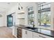 Kitchen with white cabinets, a wine cooler, and a view of the backyard at 3917 Delinger Dr, Mount Pleasant, SC 29466