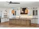 Modern kitchen with a large island, stainless steel appliances, and hardwood floors at 3917 Delinger Dr, Mount Pleasant, SC 29466