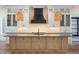 Modern kitchen with large island, stainless steel appliances, and hardwood floors at 3917 Delinger Dr, Mount Pleasant, SC 29466