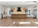 Open concept kitchen with hardwood floors and large island at 3917 Delinger Dr, Mount Pleasant, SC 29466