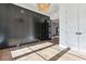Sunlit office with hardwood floors, dark wainscoting, and white doors at 3917 Delinger Dr, Mount Pleasant, SC 29466