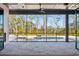 Bright screened porch with pool view and fireplace at 3917 Delinger Dr, Mount Pleasant, SC 29466