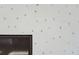 Close-up of a unique wall texture with small stones embedded in plaster at 3917 Delinger Dr, Mount Pleasant, SC 29466