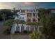 Luxury beachfront home with expansive decks and ocean views at 4001 Palm Blvd, Isle of Palms, SC 29451