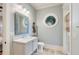 Charming bathroom with white vanity, marble countertop, and a toilet at 4001 Palm Blvd, Isle of Palms, SC 29451