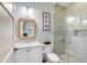 Elegant bathroom with a white vanity and glass shower at 4001 Palm Blvd, Isle of Palms, SC 29451