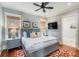 Bedroom with king-size bed and ceiling fan at 4001 Palm Blvd, Isle of Palms, SC 29451