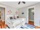 Bedroom with twin beds, nautical decor, and rug at 4001 Palm Blvd, Isle of Palms, SC 29451