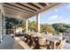 Outdoor dining area on spacious deck with nice view at 4001 Palm Blvd, Isle of Palms, SC 29451