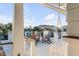 Relaxing deck with hanging chair and ocean view at 4001 Palm Blvd, Isle of Palms, SC 29451