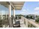 Ocean view deck with two rocking chairs at 4001 Palm Blvd, Isle of Palms, SC 29451