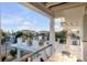 Large deck with multiple seating areas and ocean views at 4001 Palm Blvd, Isle of Palms, SC 29451