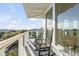 Deck with rocking chairs and ocean views at 4001 Palm Blvd, Isle of Palms, SC 29451