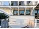 Deck with hanging chairs and white railings at 4001 Palm Blvd, Isle of Palms, SC 29451
