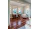 Bright home office with hardwood floors and built-in desk at 4001 Palm Blvd, Isle of Palms, SC 29451