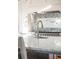 Close-up of elegant kitchen faucet with marble countertop at 4001 Palm Blvd, Isle of Palms, SC 29451