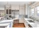 Spacious kitchen with stainless steel appliances and white cabinetry at 4001 Palm Blvd, Isle of Palms, SC 29451