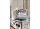 Modern kitchen features a professional range and custom cabinetry at 4001 Palm Blvd, Isle of Palms, SC 29451