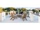 Relaxing rooftop deck with fire pit and seating, offering scenic views at 4001 Palm Blvd, Isle of Palms, SC 29451