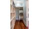 Well-organized walk-in closet with shelving and hanging space at 4001 Palm Blvd, Isle of Palms, SC 29451