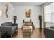 Modern living room with gray sofas and a wood coffee table at 437 Zenith Blvd, Summerville, SC 29486