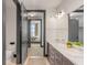Spa-like bathroom with double vanity and marble countertops at 5 Gadsdenboro St # 410, Charleston, SC 29401