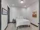 Cozy bedroom with a queen-size bed and neutral decor at 5 Gadsdenboro St # 410, Charleston, SC 29401