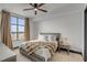 Bright bedroom with a comfy bed, large window, and ceiling fan at 5 Gadsdenboro St # 410, Charleston, SC 29401